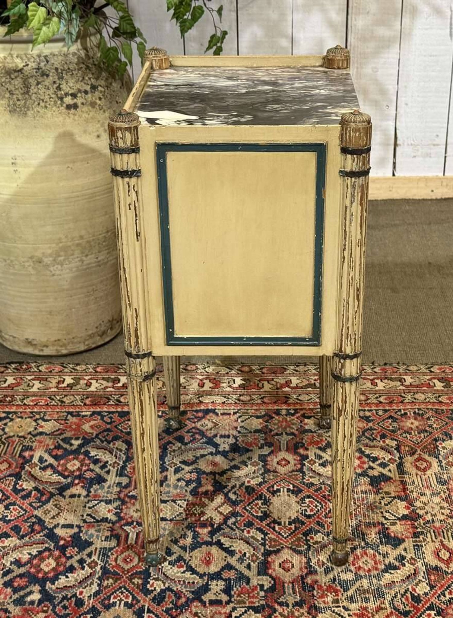 Beech bedside table painted with a marble top in Louis XVI style from the late 19th century.
