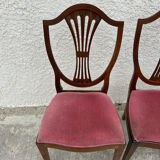Set of 6 wooden chairs sitting red