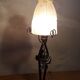 Black wrought iron lamp with gold patina