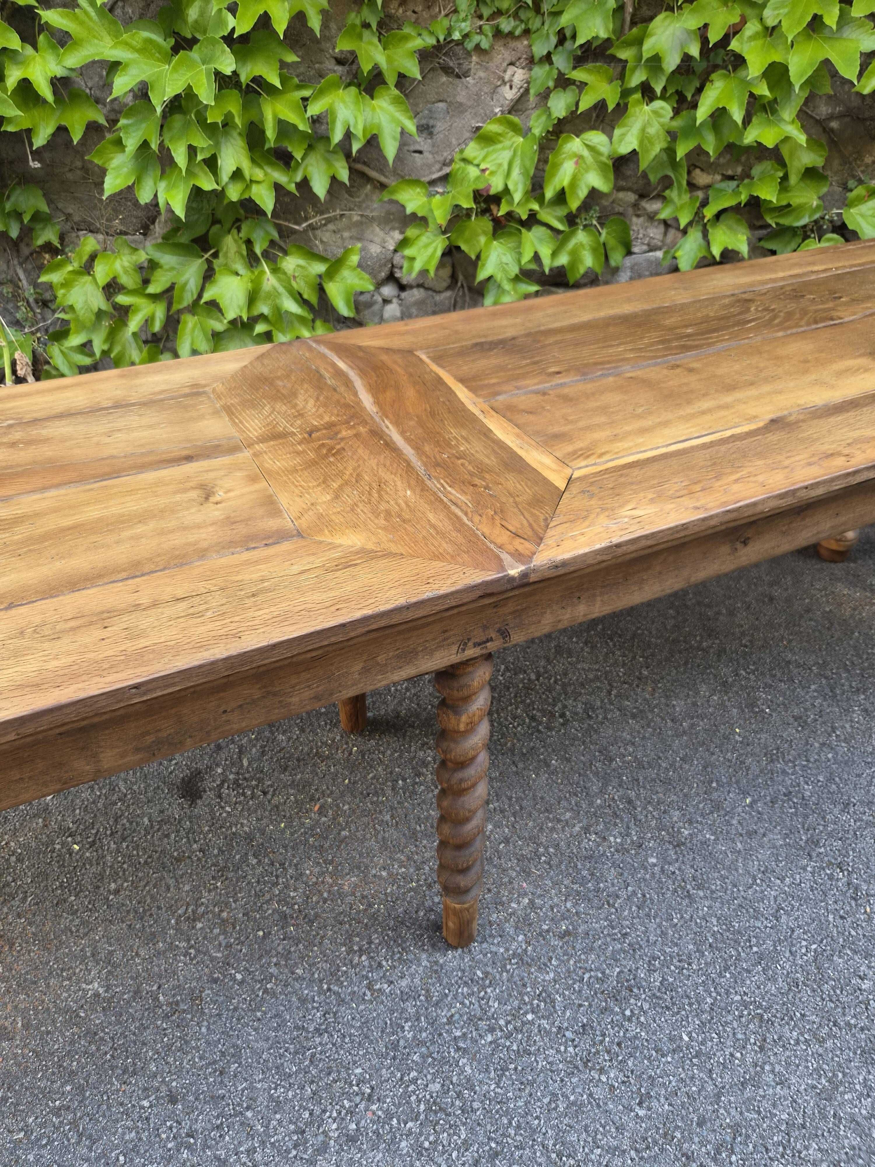 Antique French draper's table in oak, shop counter, work table, 6 feet, circa 1750–1850.