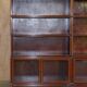 Antique pair of legal bookcases by William Baker Co in hardwood, satin and walnut.