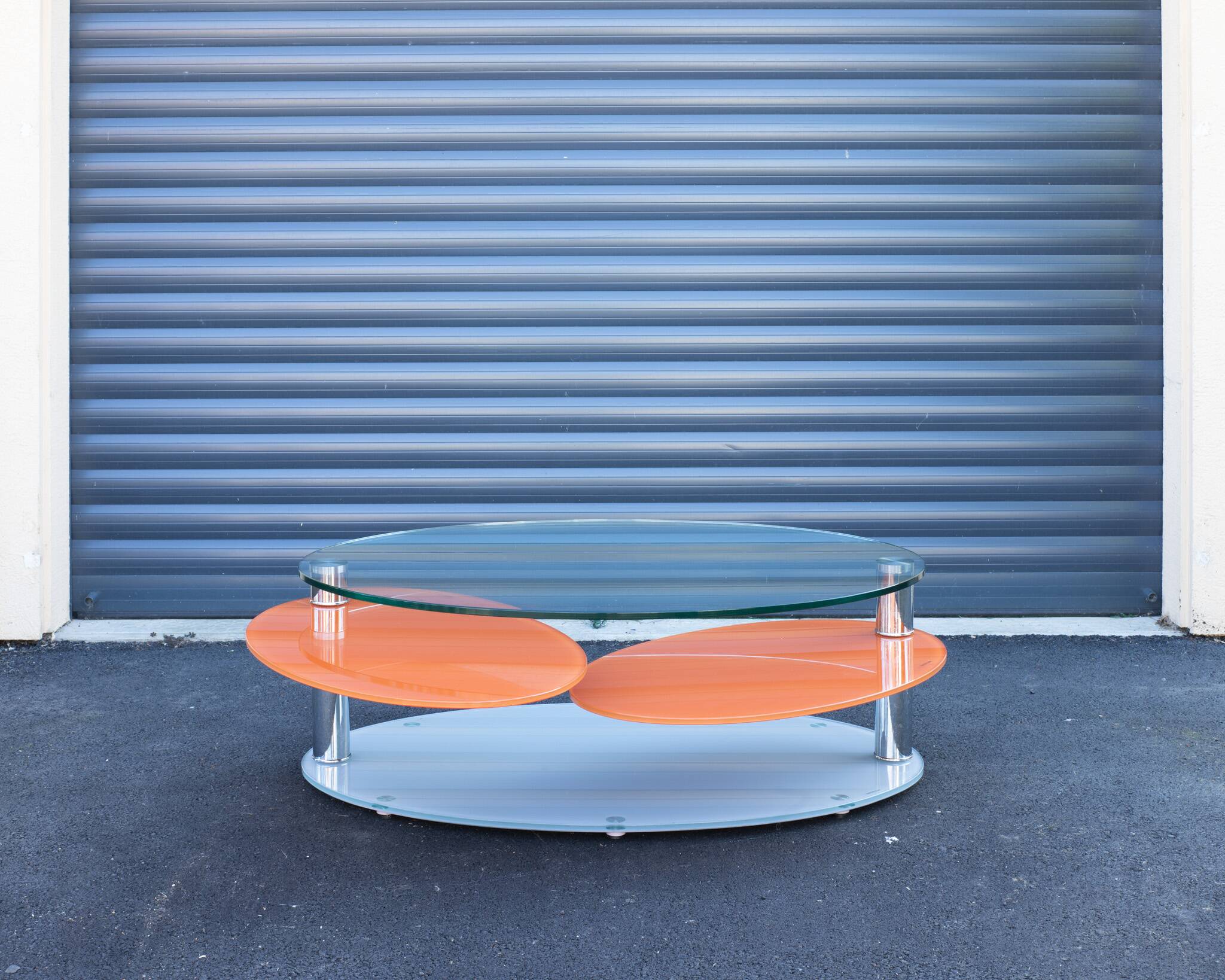 Antoine Motard designer swivel tempered glass coffee table