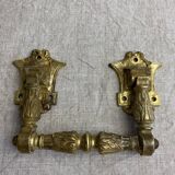 Articulated bronze handles