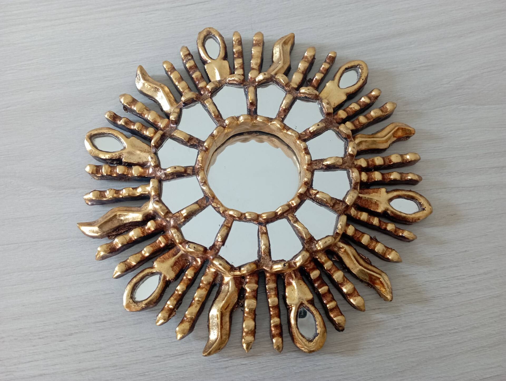 Golden wood sun mirror