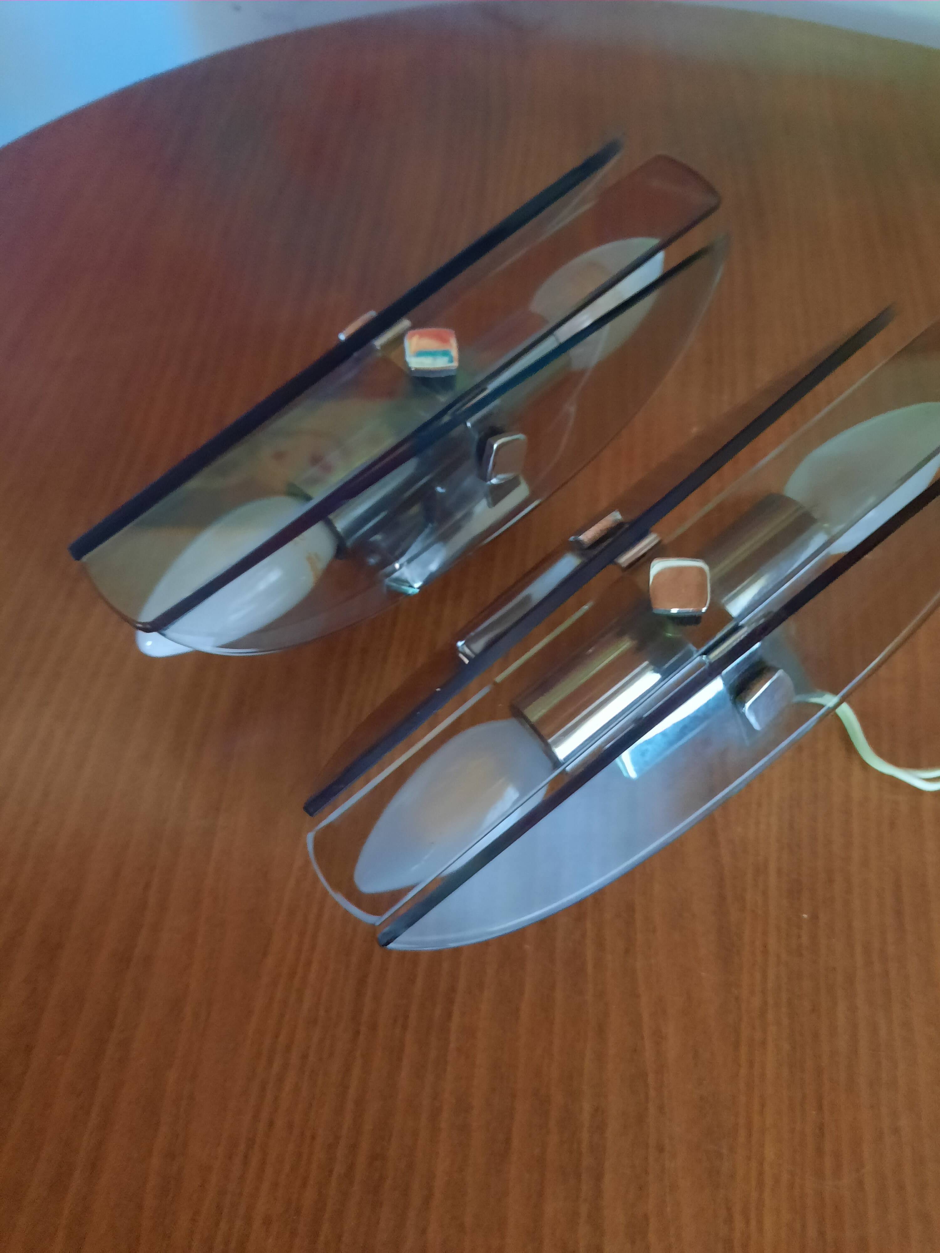 Pair of smoked glass and chrome wall lights