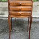 2 Louis XV bedside tables made of curved solid wood with drawers, 1920.