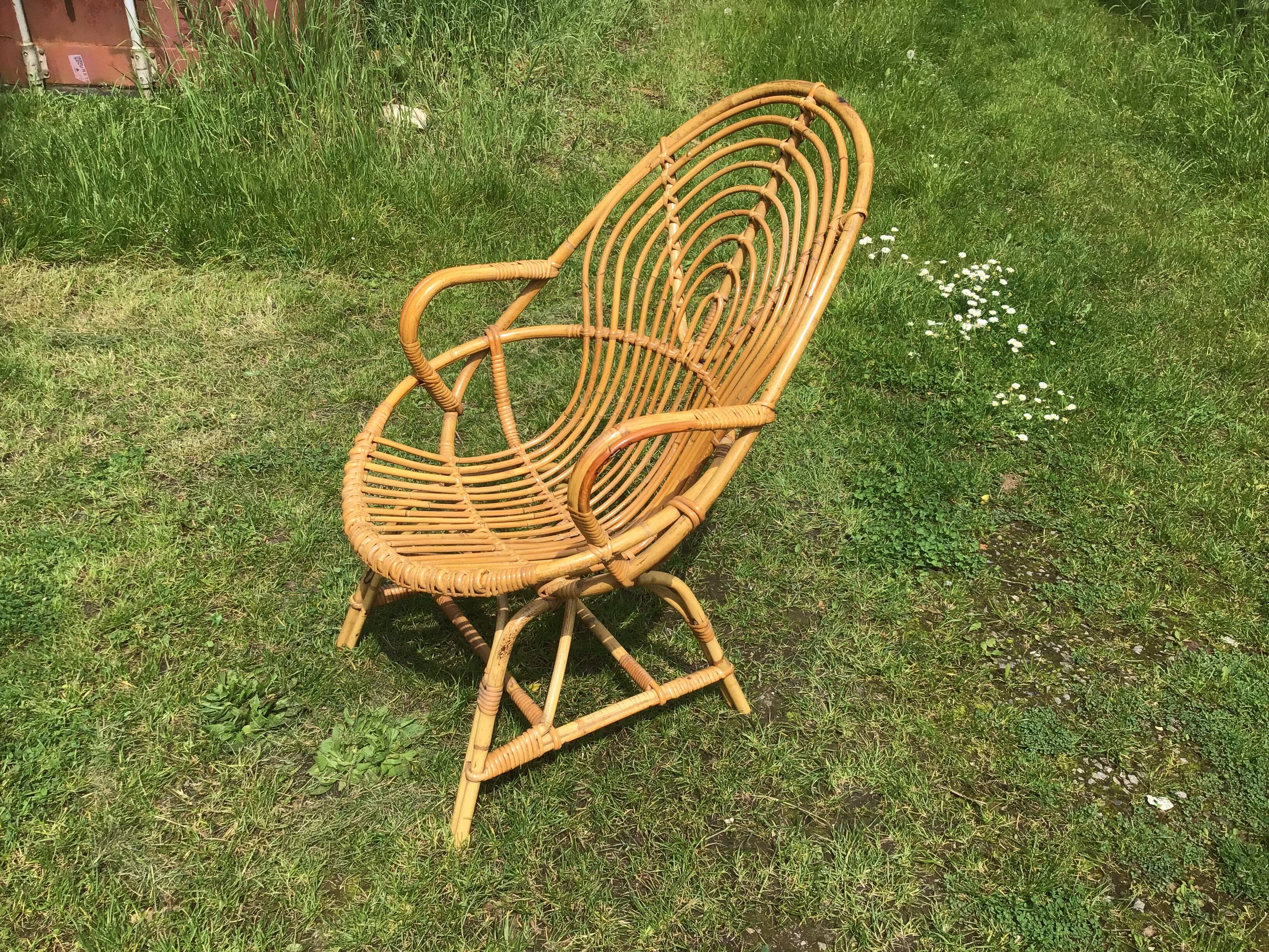 Vintage ovoid-shaped rattan armchair.