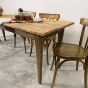 Old farmhouse table with tapered legs, late 19th to early 20th century.