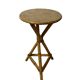 Plant holder or side table at the end of a bamboo sofa