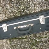 Black antique suitcase, registered trademark scot