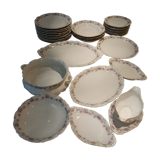 Table service 31 pieces in porcelain. Floral polychrome pattern