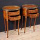 Pair of oval bedside tables in marquetry from the 20th century.
