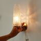 Vintage wall light in brass and etched glass.