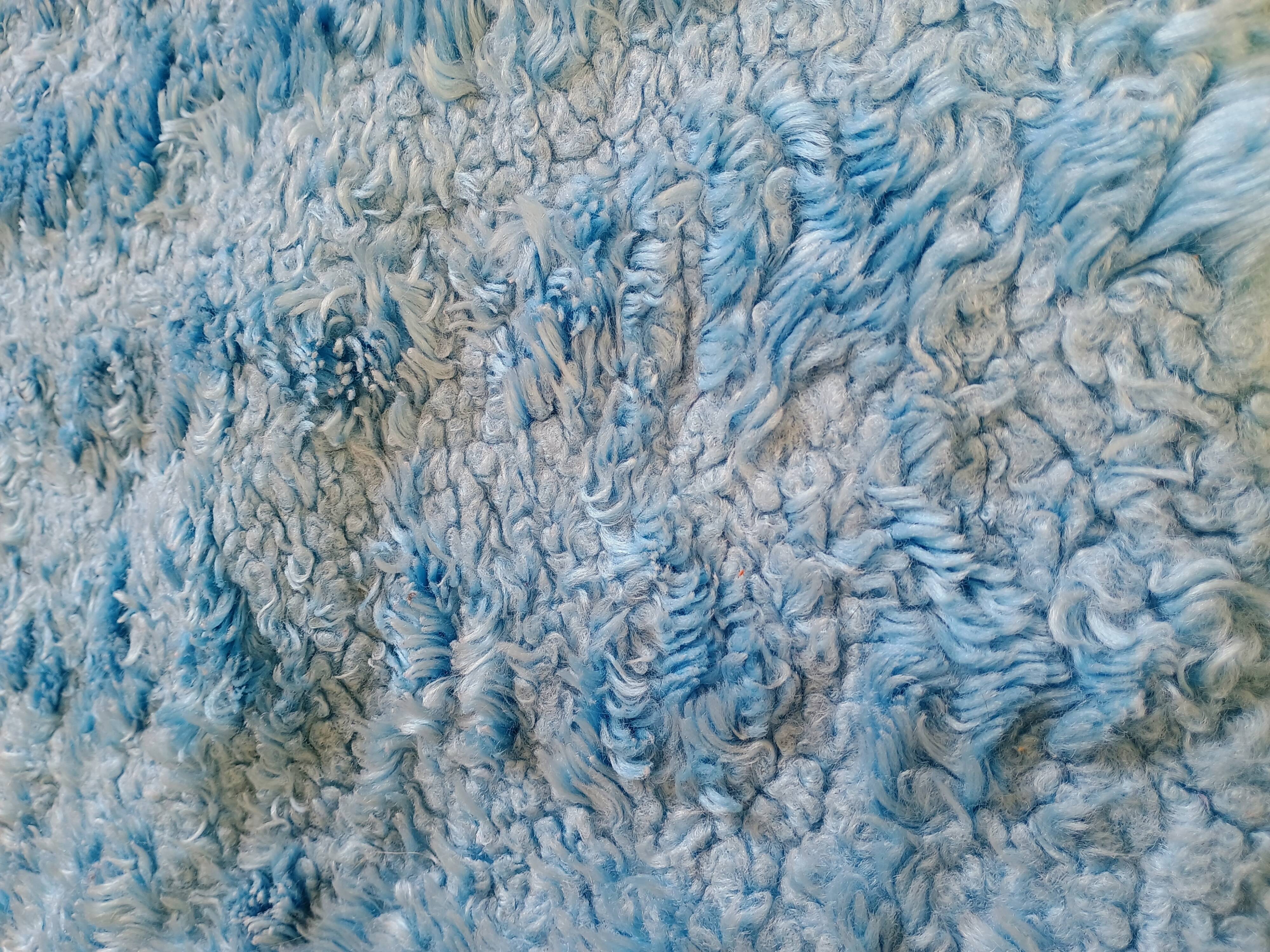 Set of two vintage sky blue rugs from the 70s