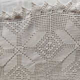White cotton bedspread, crocheted sofa throw with star patterns