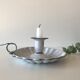 Candlestick in white enameled metal