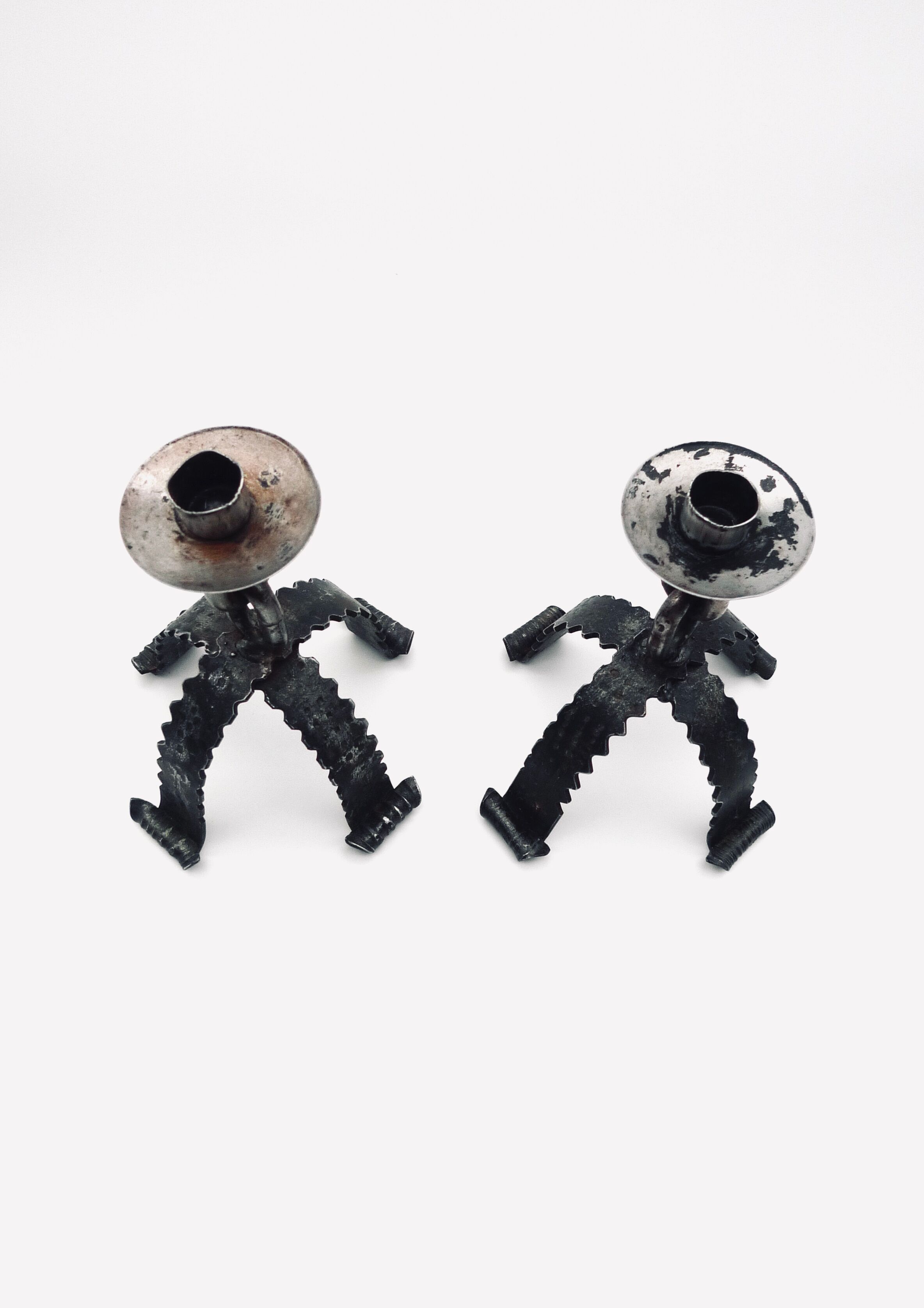 Set of two wrought iron candle holders