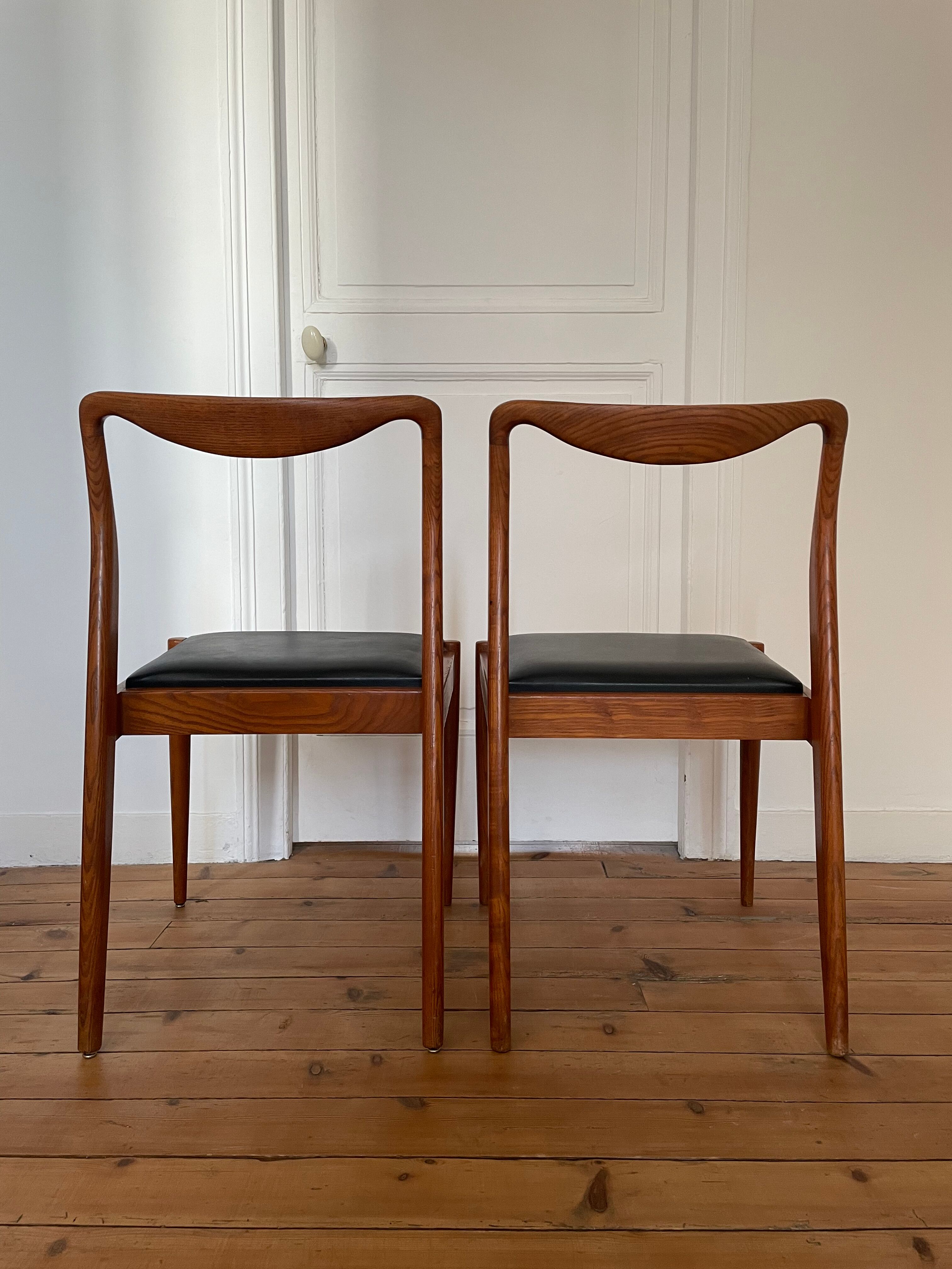 Pair of Scandinavian chairs in teak and skaï, 1965