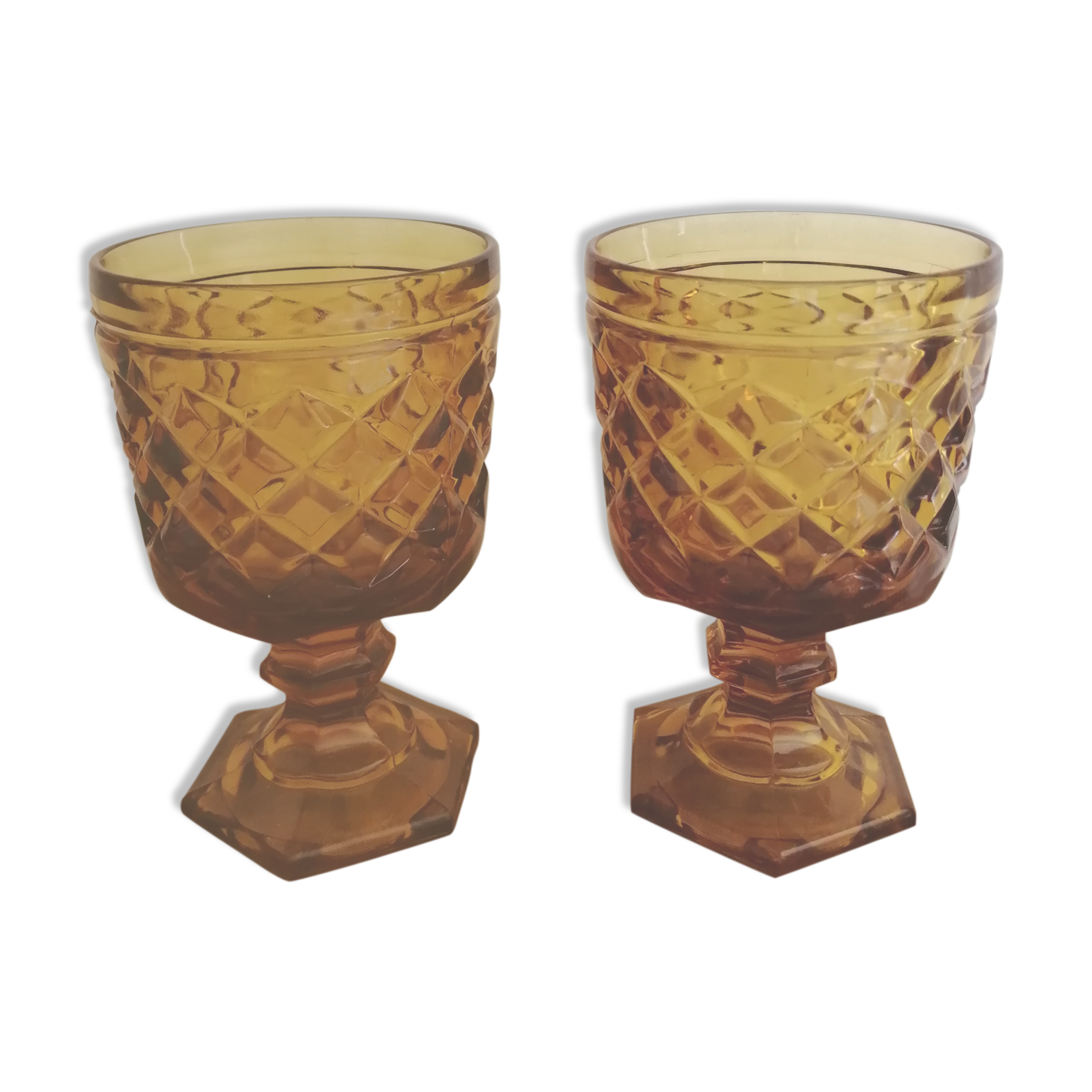 2 vintage amber walking glasses