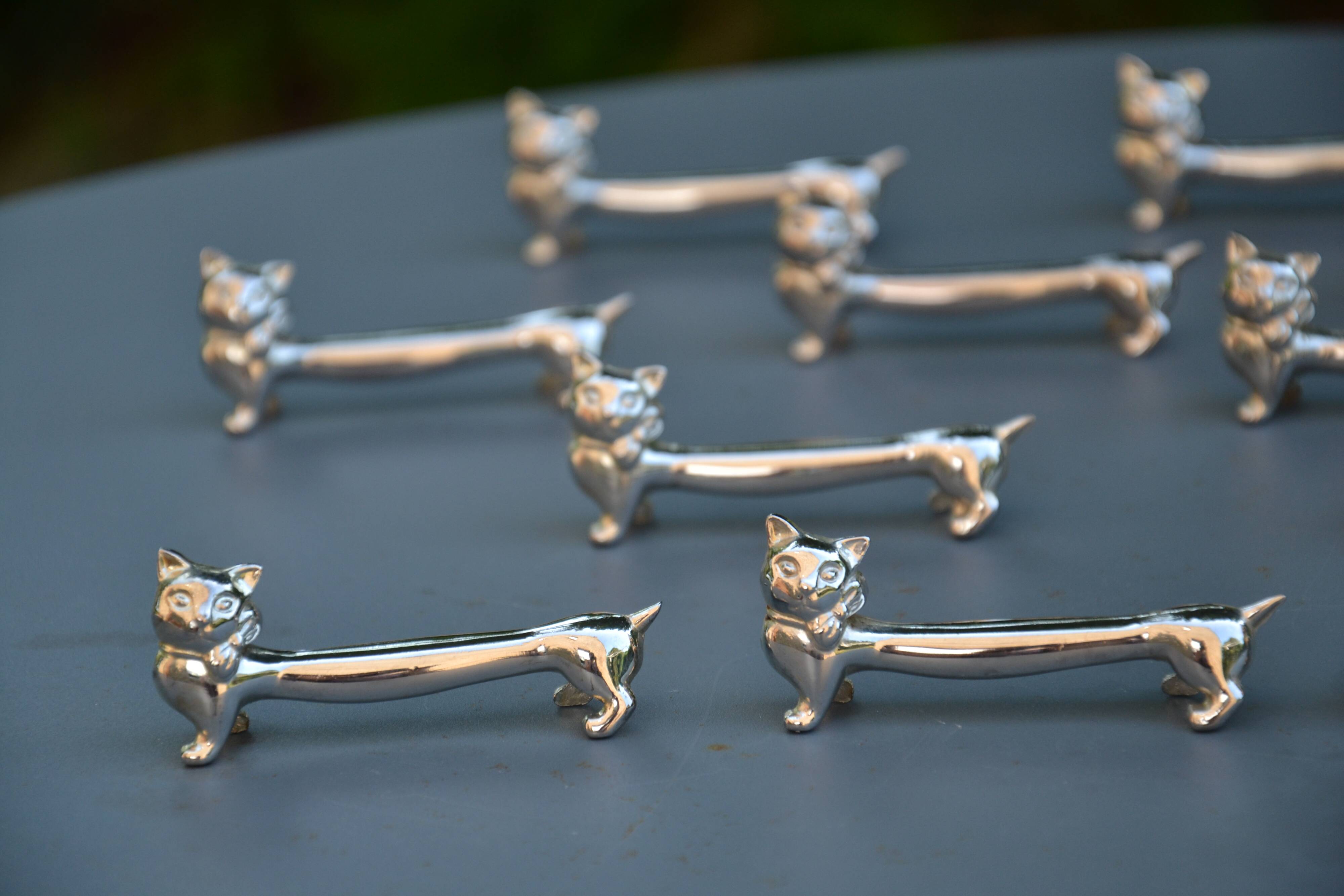 12 silver-plated cat knife rests