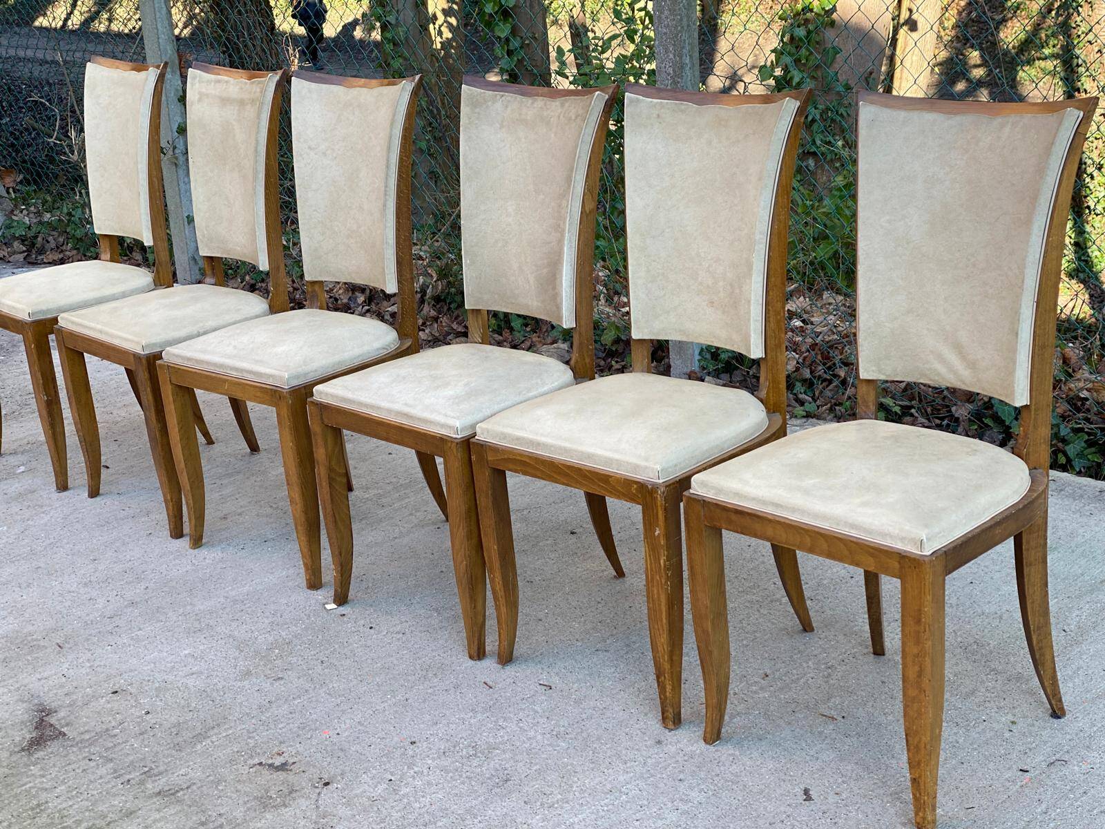6 Italian Scandinavian style dining chairs from the 1950s in wood and leather.