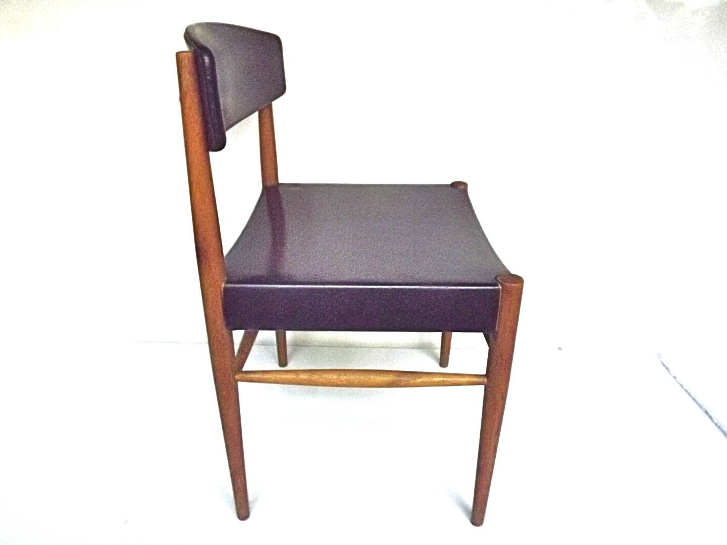 Four Scandinavian-style chairs