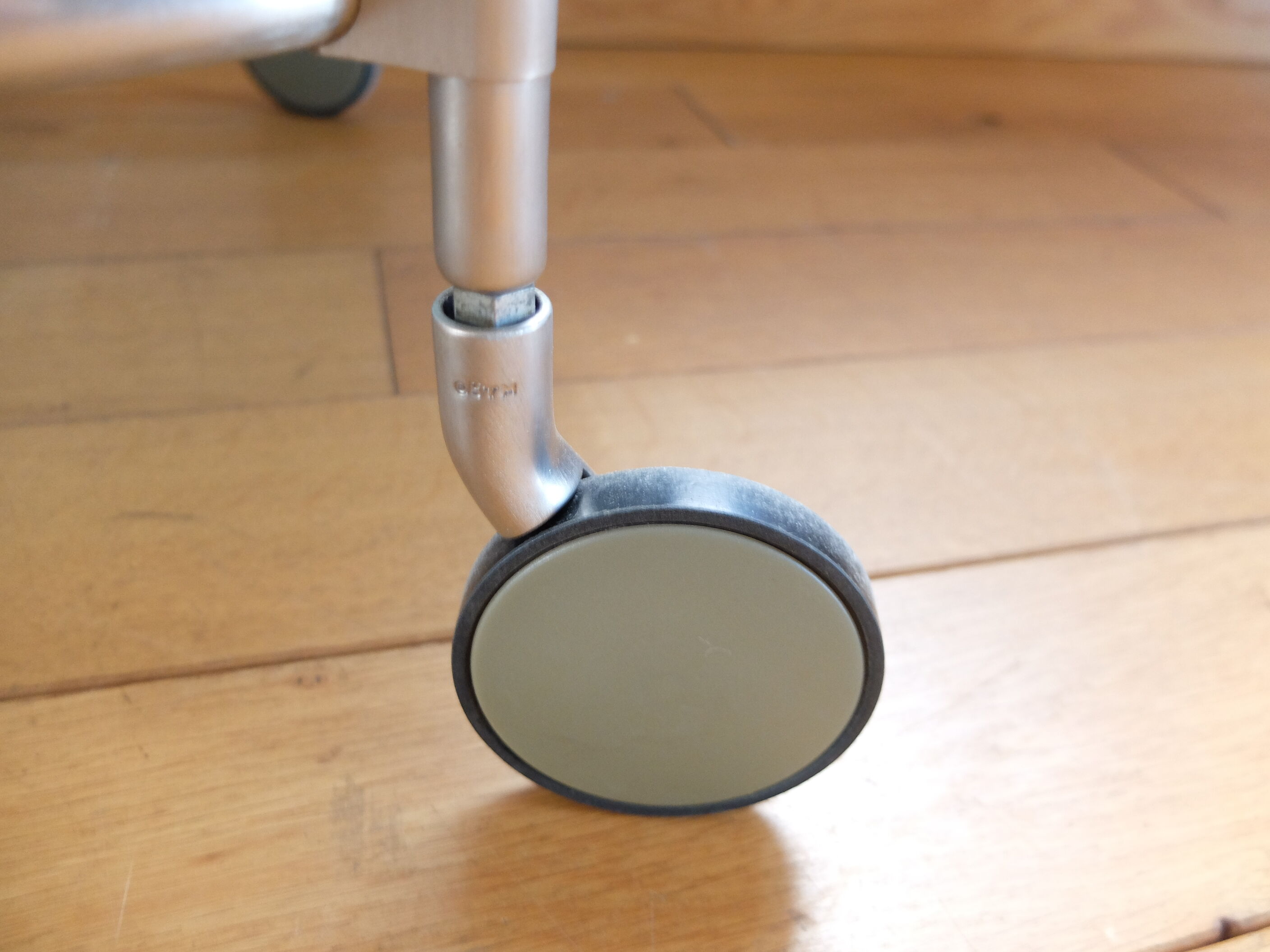 1970s stainless steel pedestal table with two glass tops