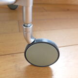 1970s stainless steel pedestal table with two glass tops