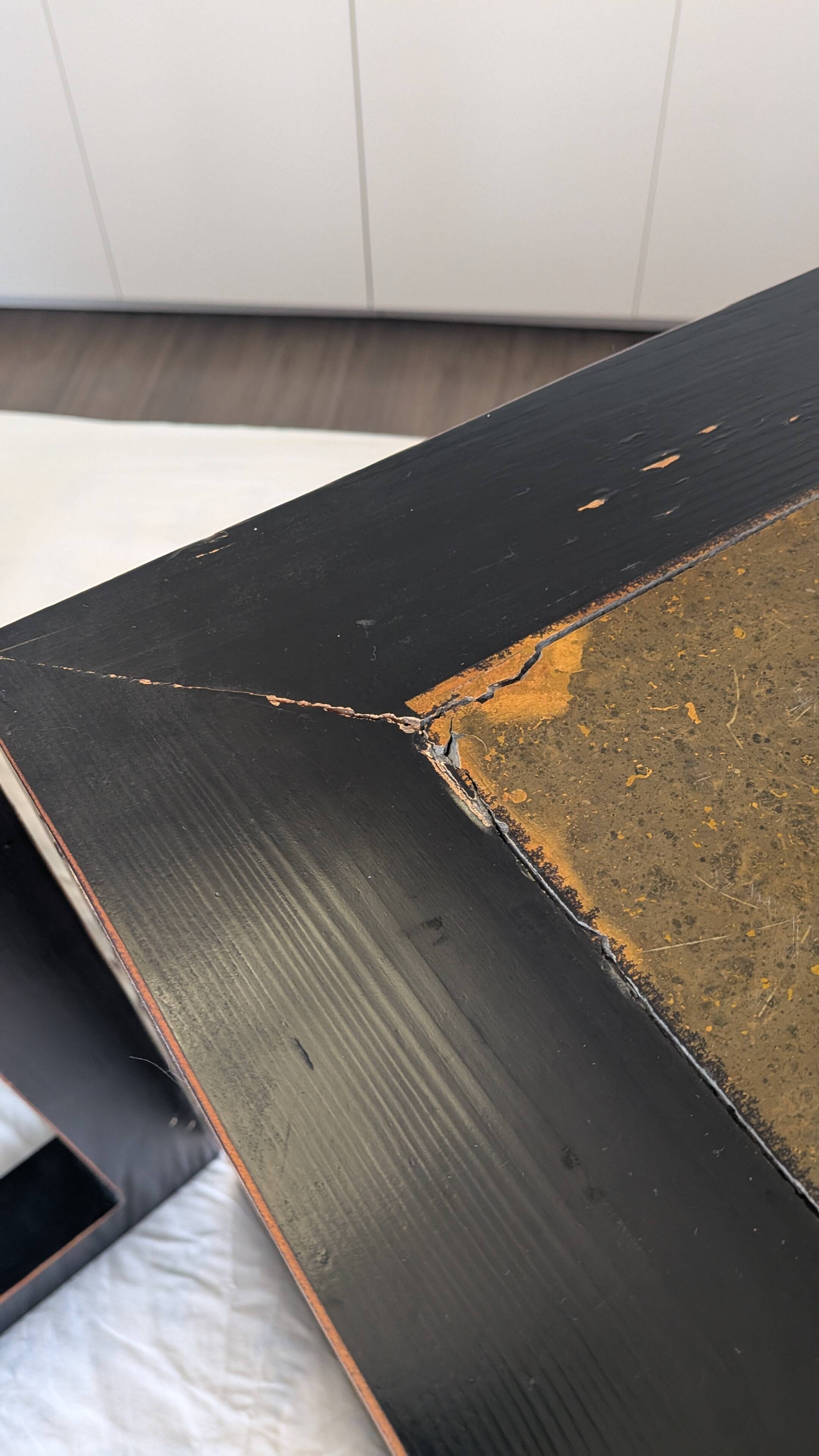 Chinese side tables in black lacquer, stone top.