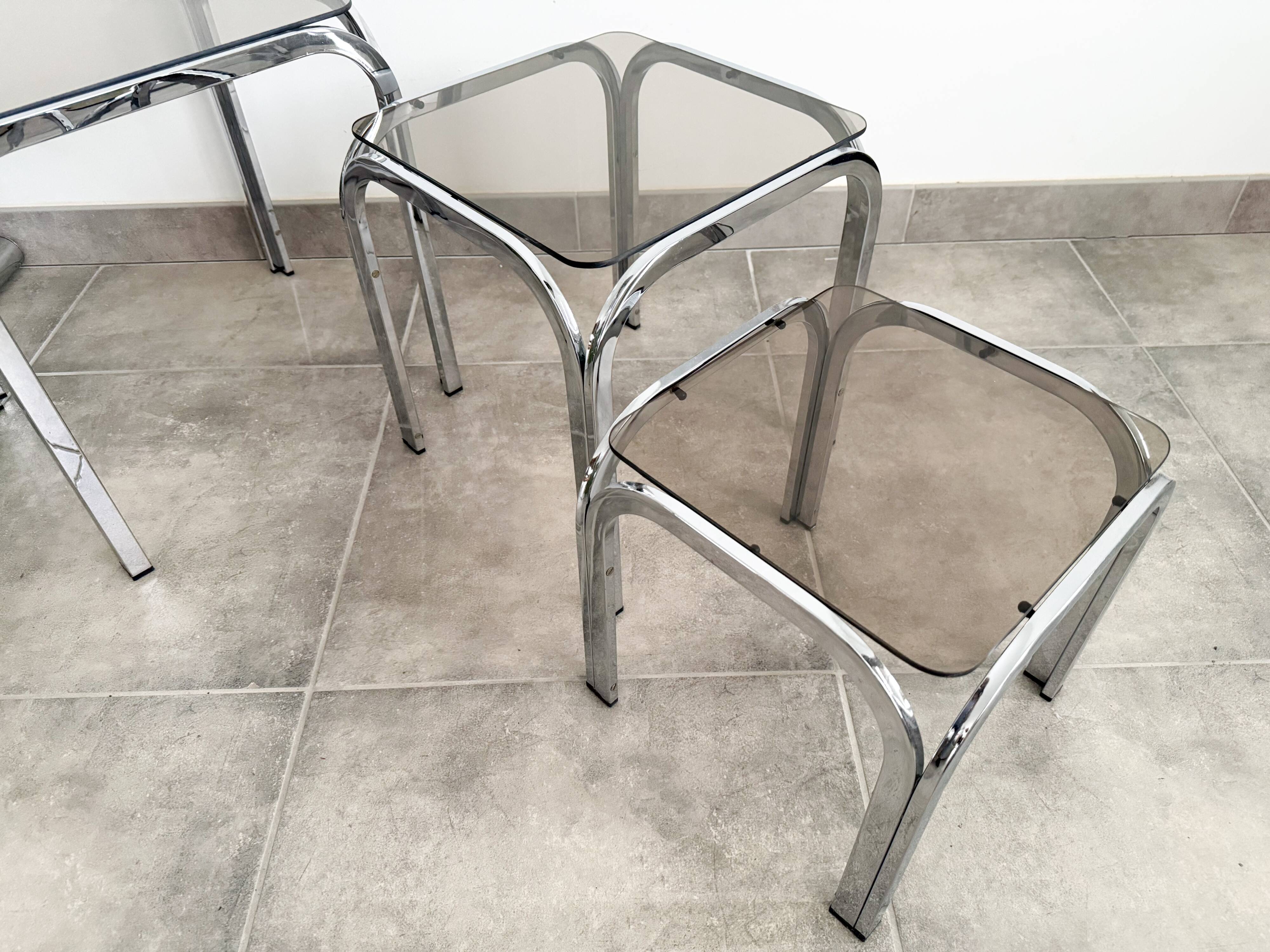 Set of 3 nesting tables, chrome and smoked glass, 1970s.
