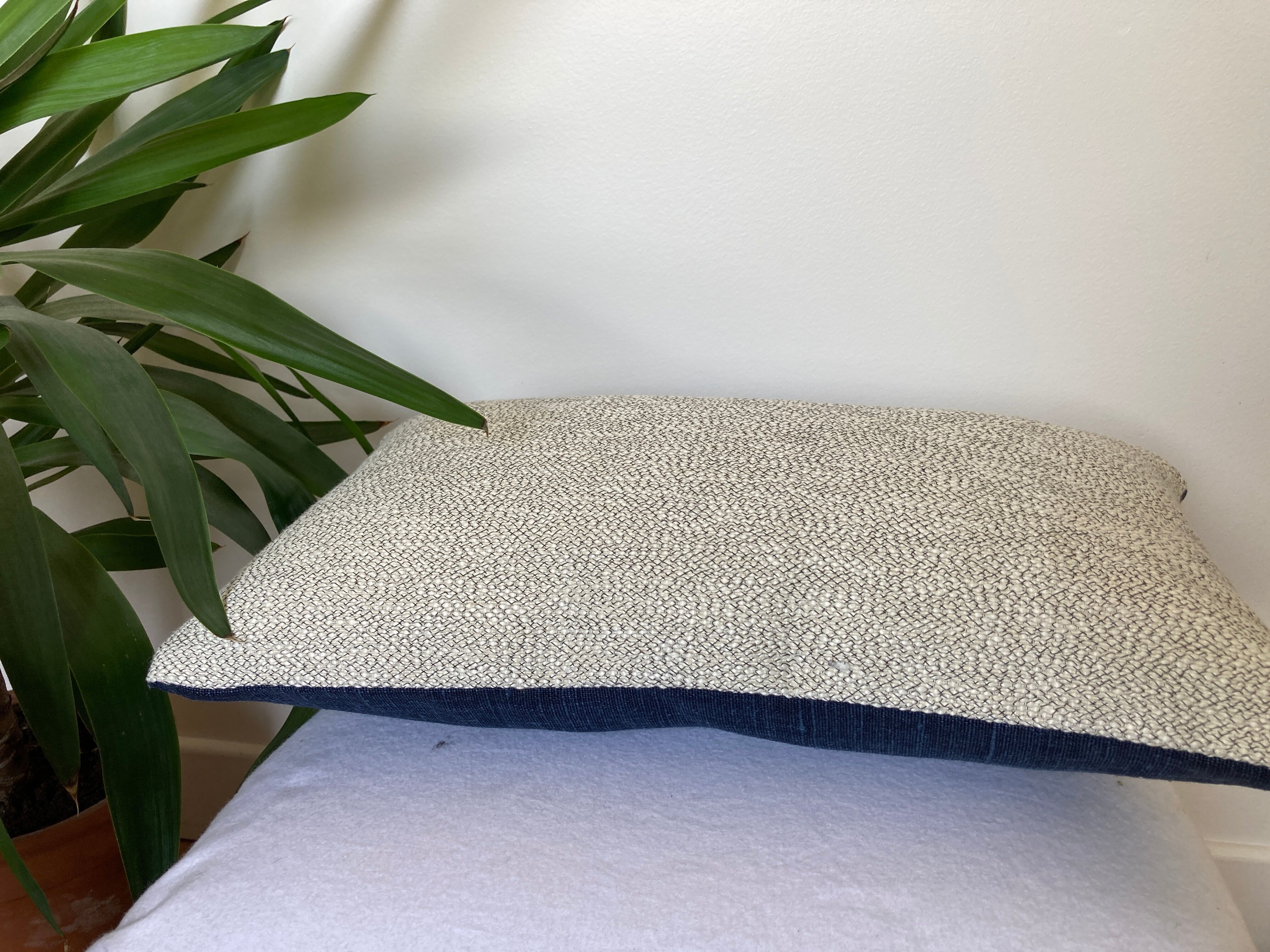 Two-sided cushion braided white black navy blue