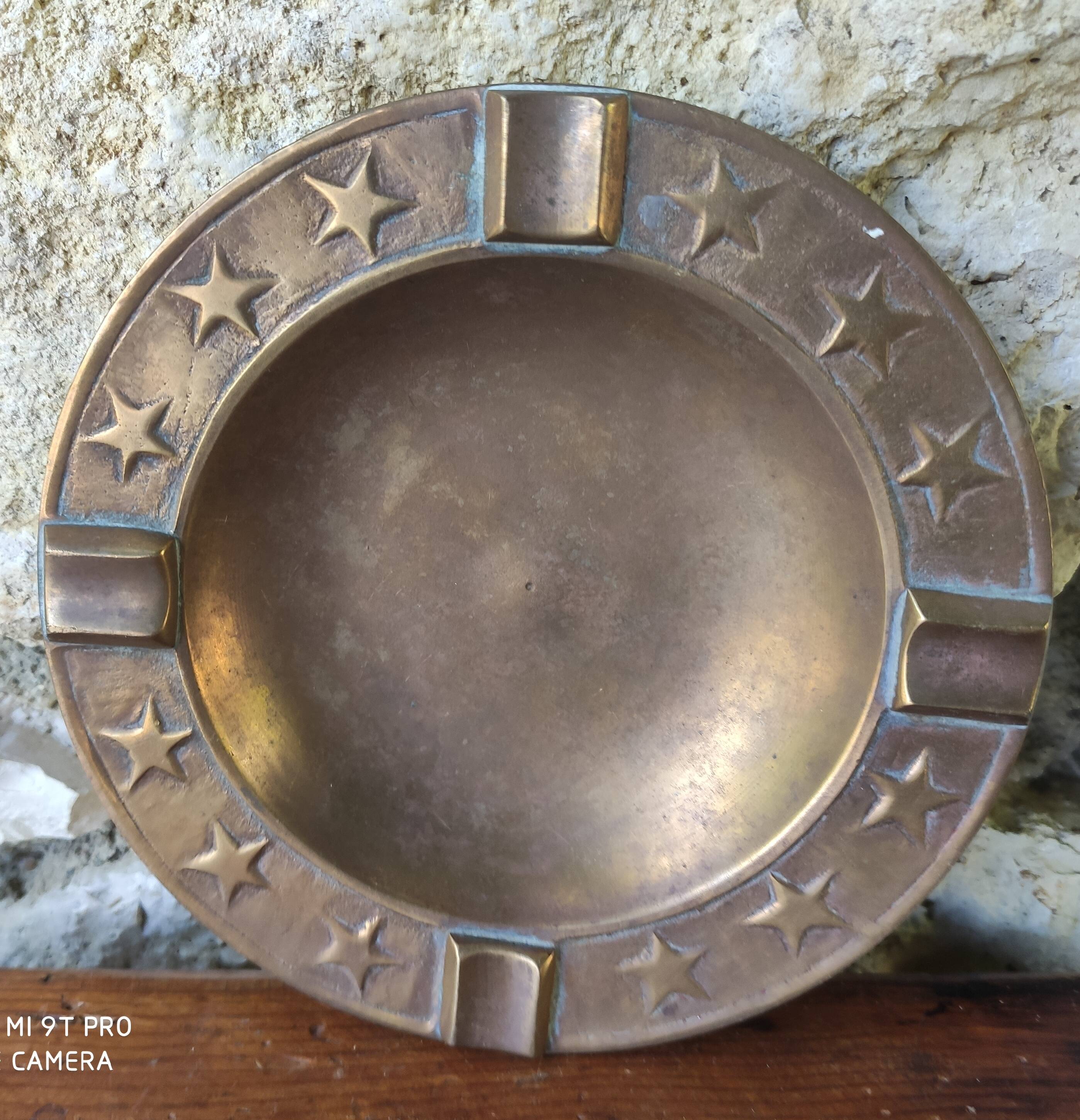 Brass ashtray with stars