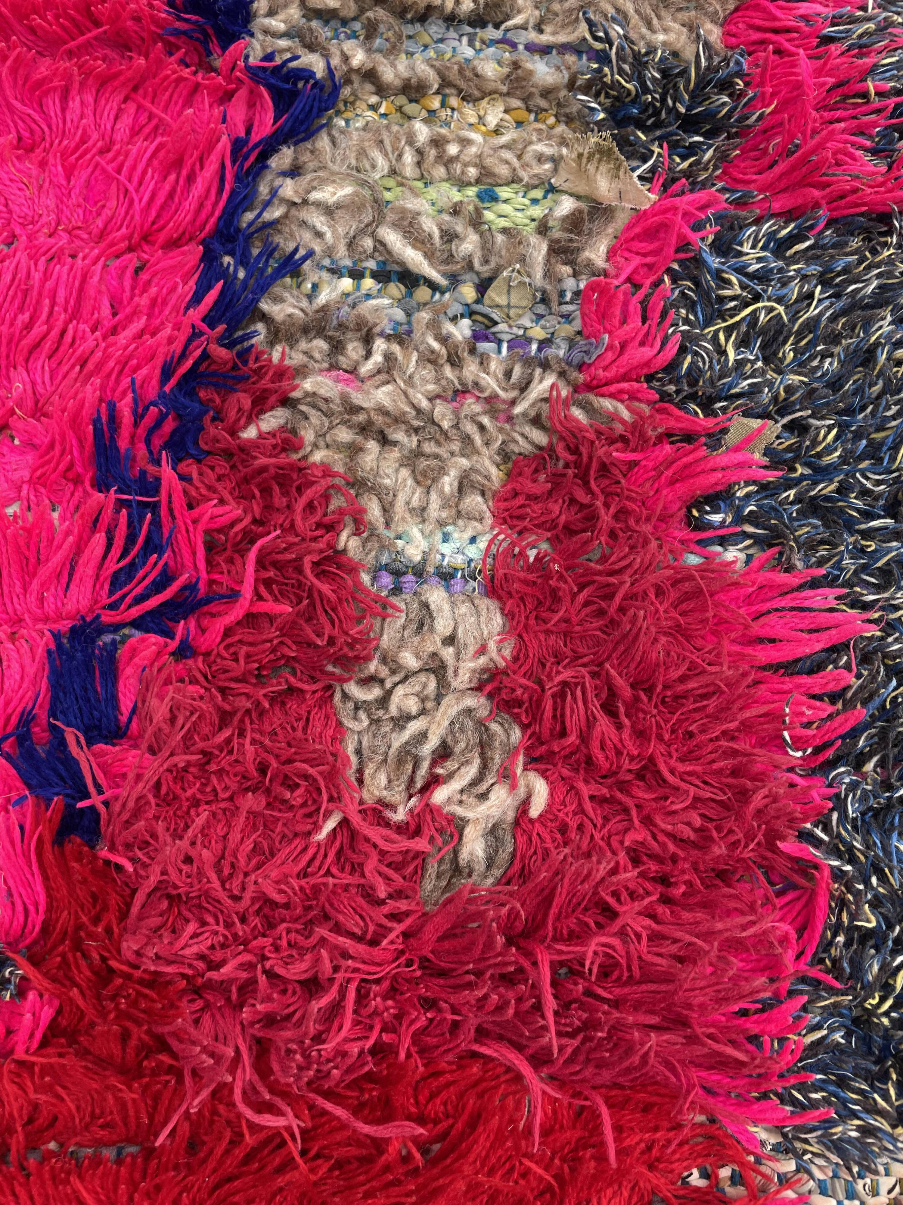 Modern red berber carpet in boucherouite fabrics