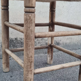 Vintage handmade wooden stool and rope