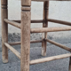 Vintage handmade wooden stool and rope