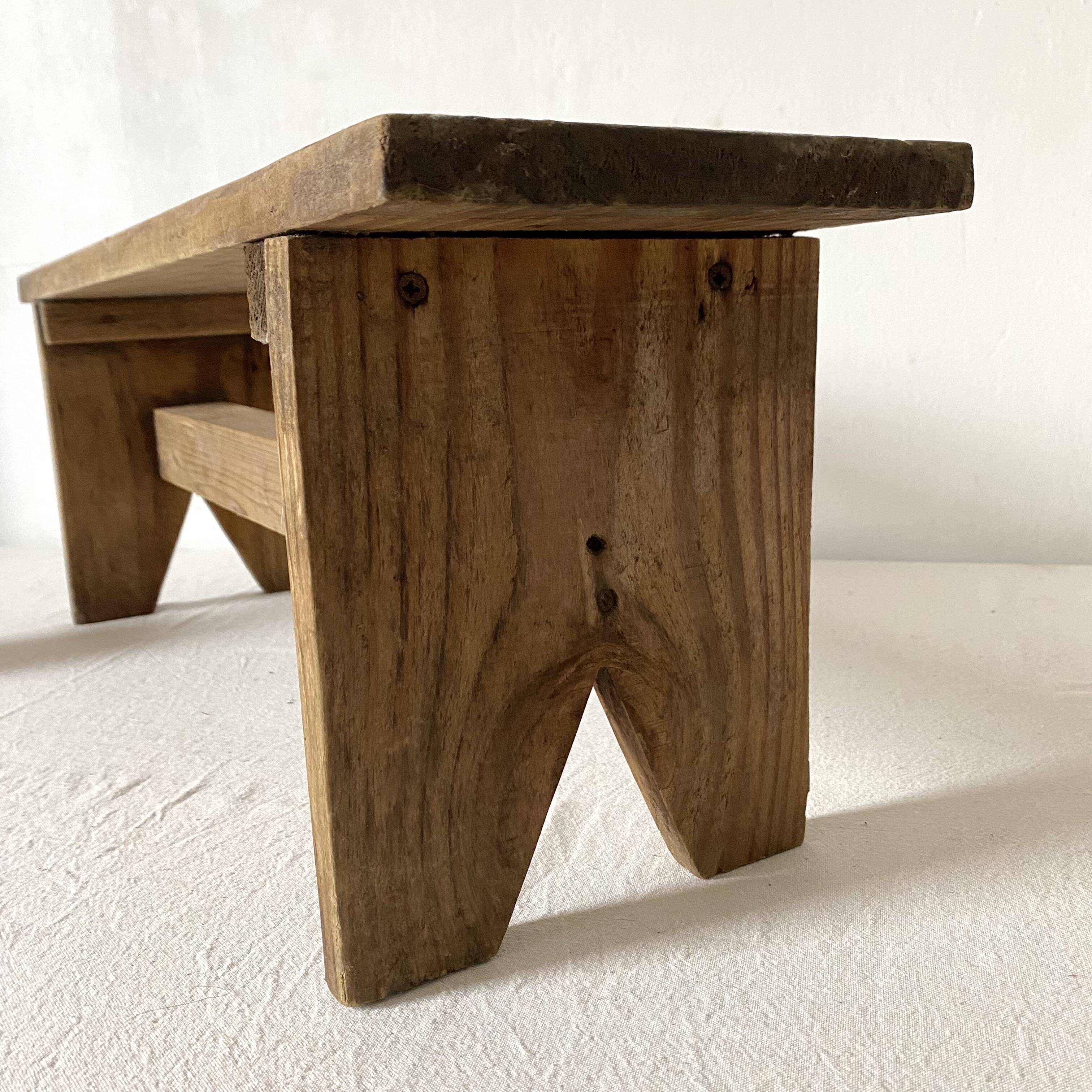 Low stool in raw wood