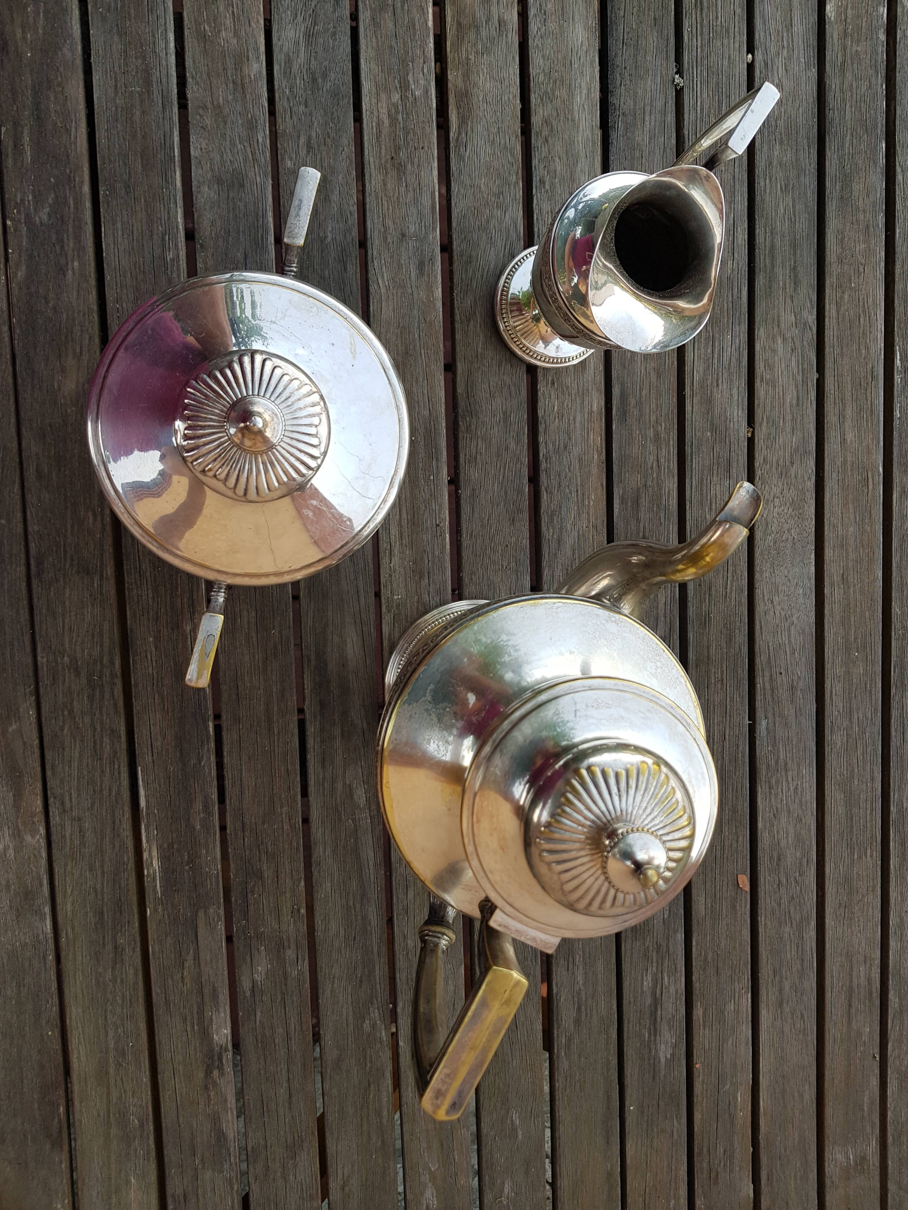 Silver metal coffee serving part