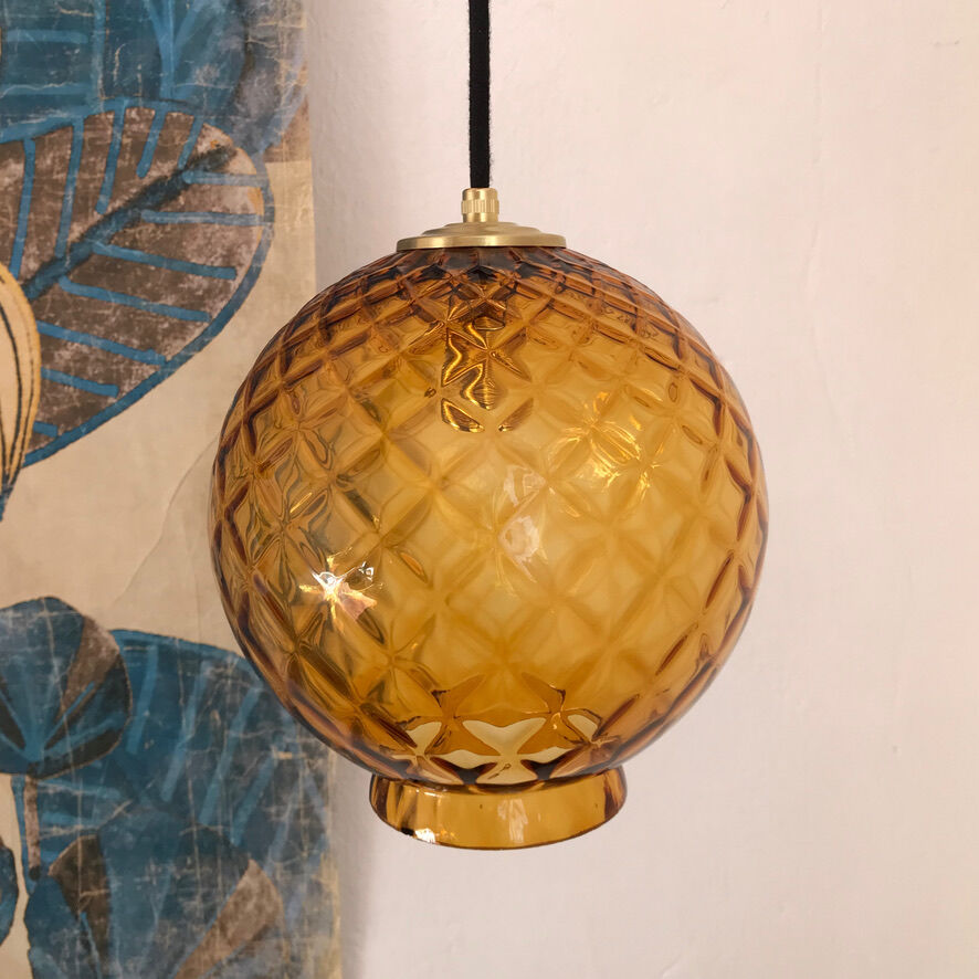 Amber glass globe suspension