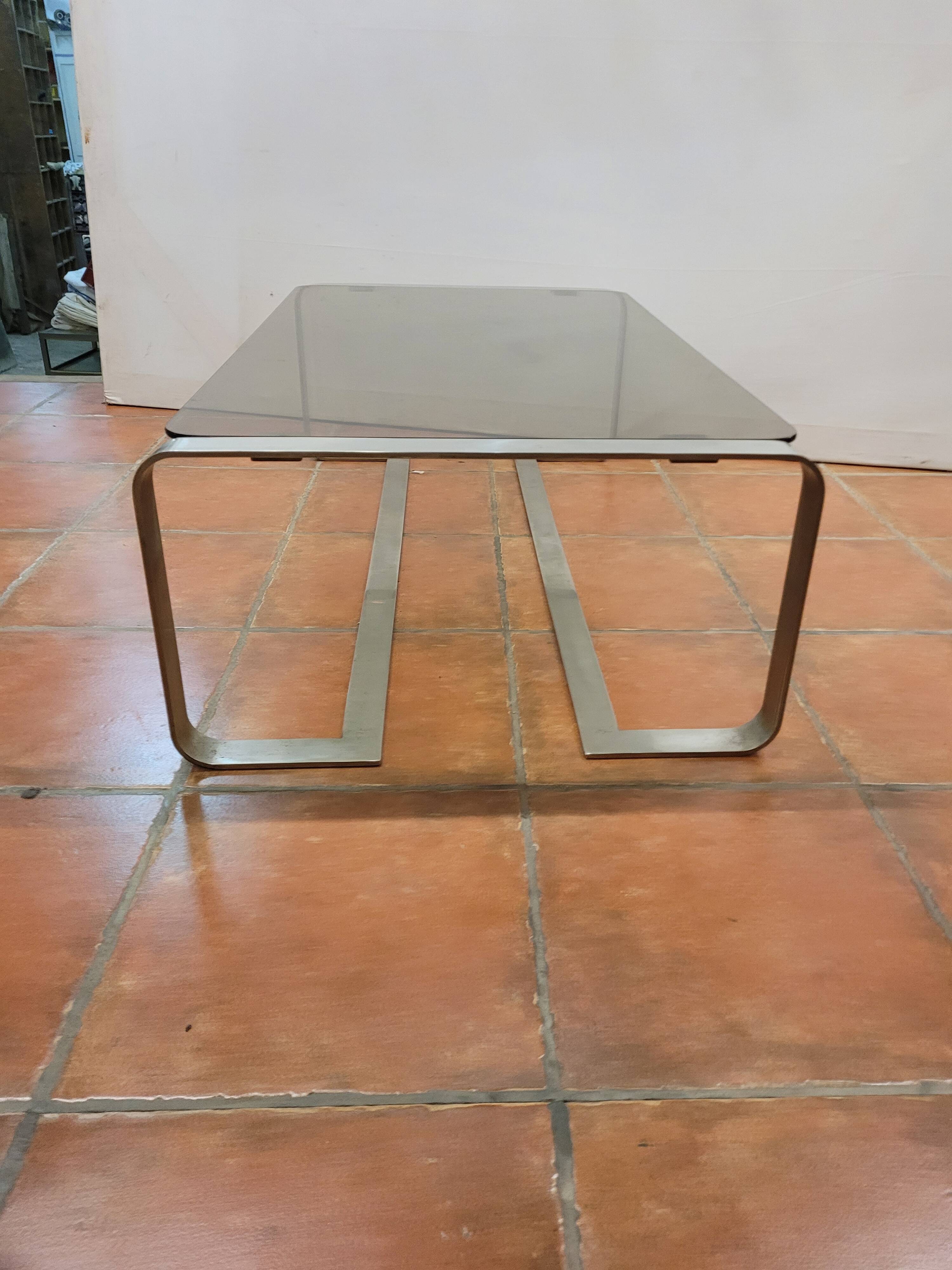 Coffee table with stainless steel base and smoked glass, from the 70s