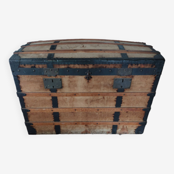 Old curved wood and wrought iron trunk