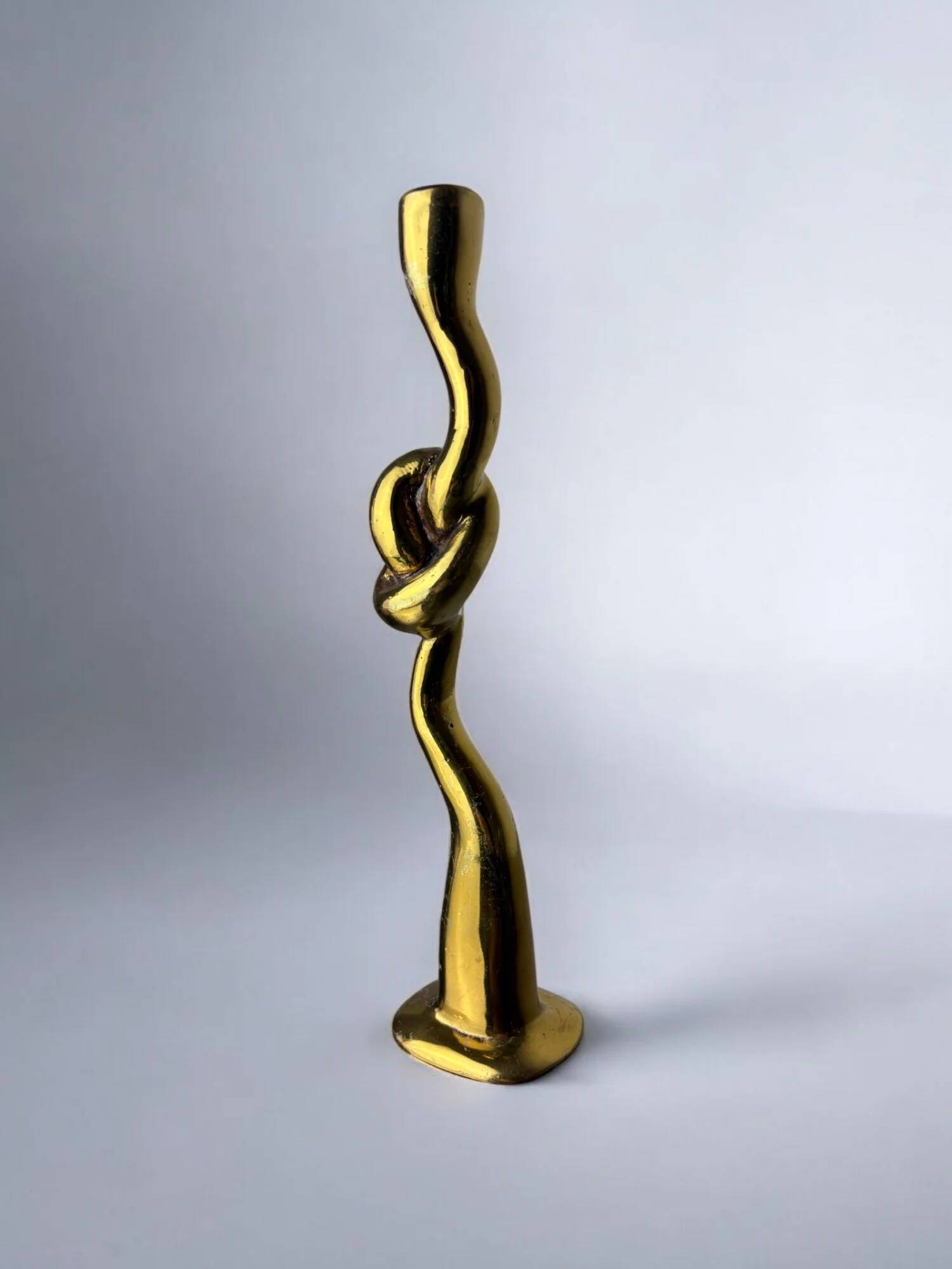 Italian brutalist knot candlestick in bronze, circa 1970