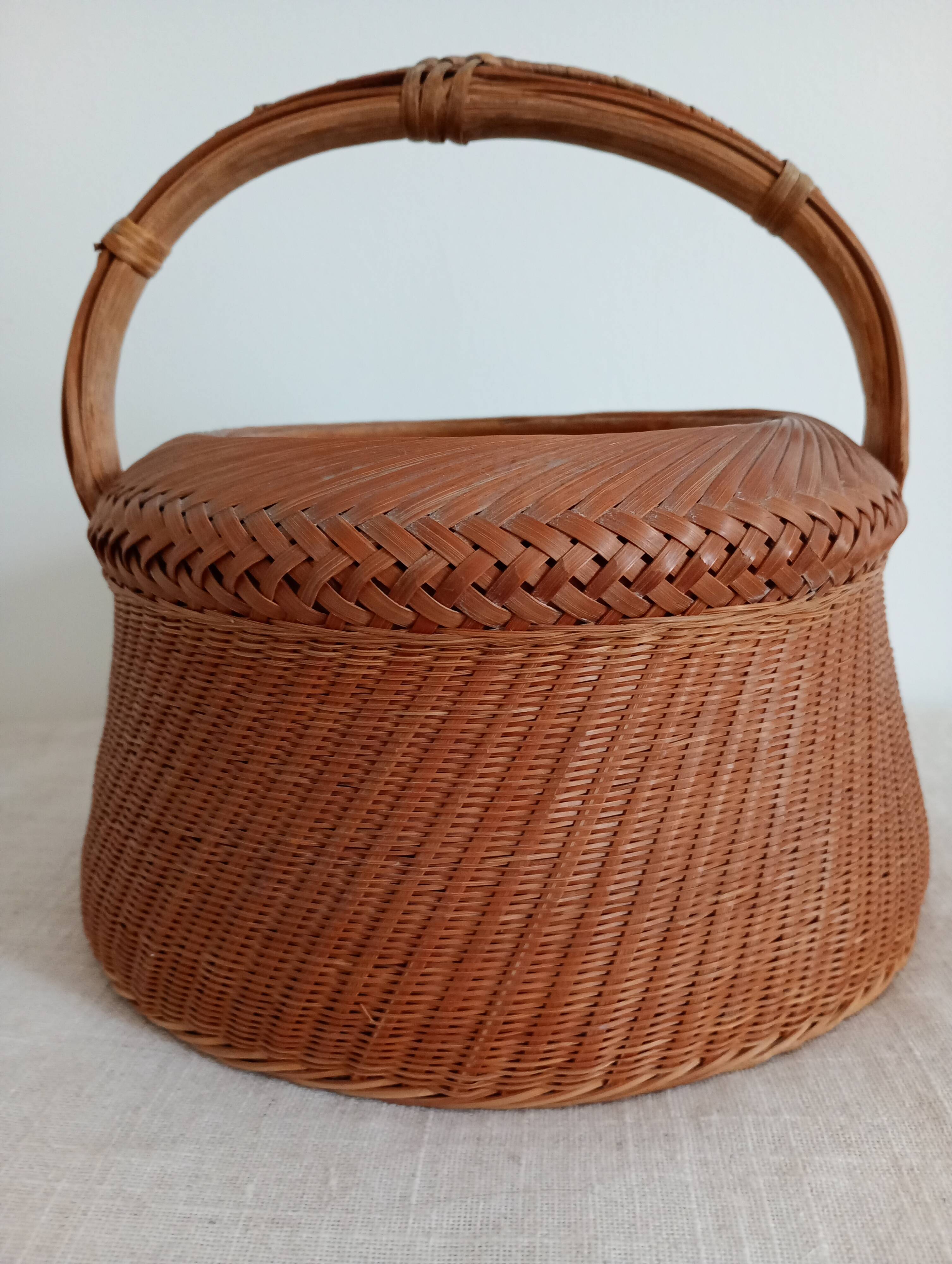 Woven bamboo basket and ceramic. Philippines.