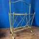 Neoclassical brass magazine rack. Maison Jansen. 1940s.