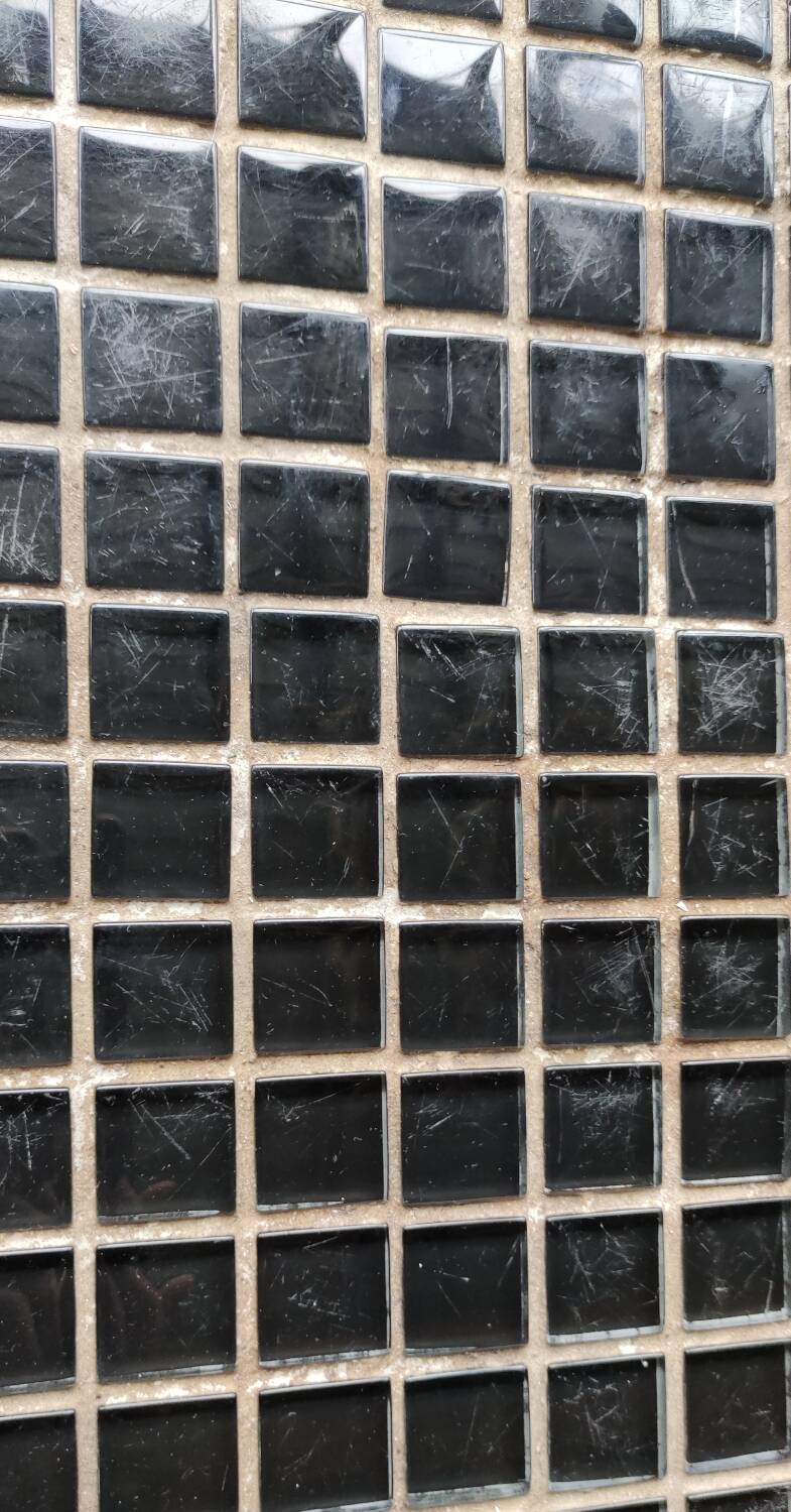 Old wrought iron table / ceramic tile top