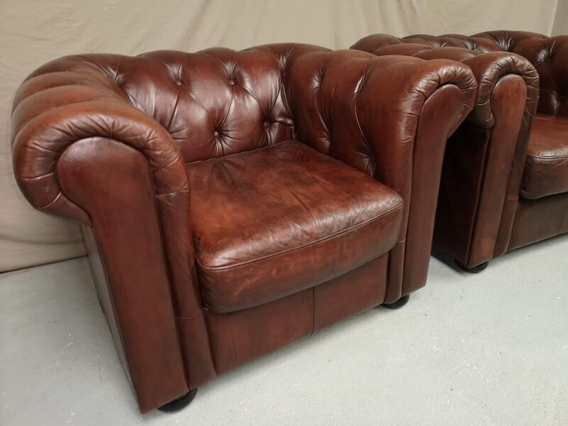 Brown brown leather chesterfield armchairs