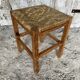 Tabouret ancien en bois sculpté et paille