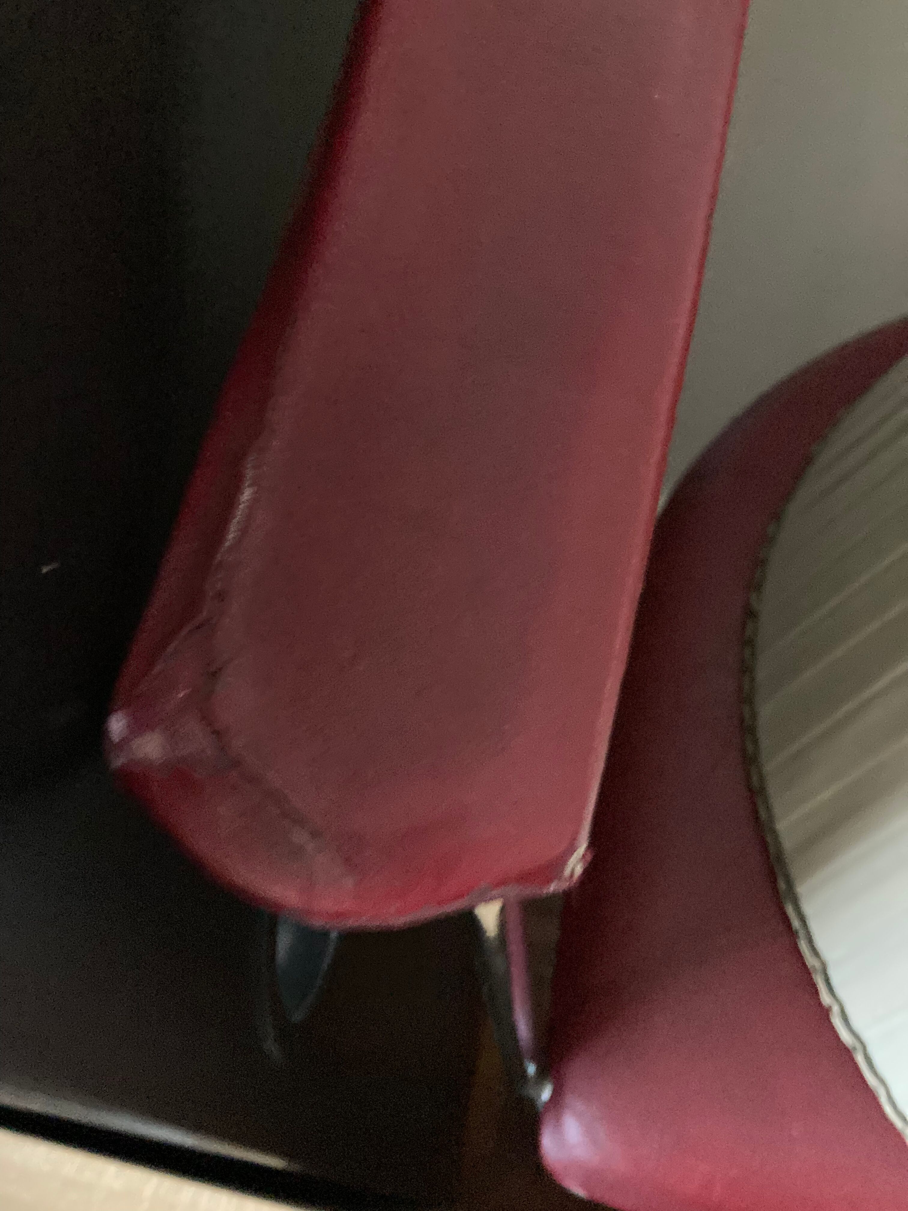 Pair of red chairs in 80s skai