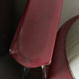 Pair of red chairs in 80s skai