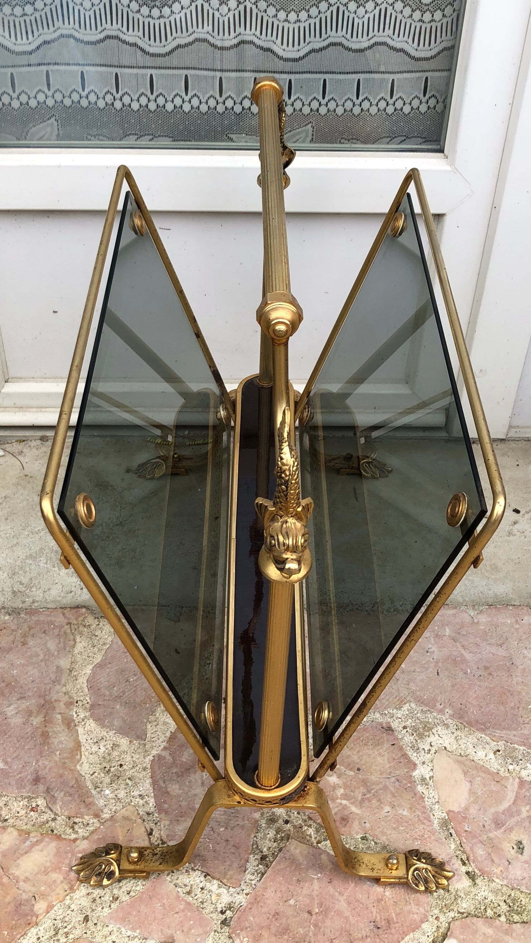 Revised door in brass and smoked glass