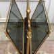 Revised door in brass and smoked glass